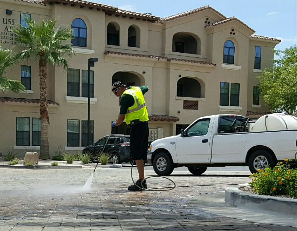 Pressure washing commercial complex